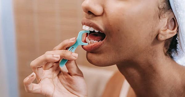 Which comes first, brushing or flossing? New study shows that we should clean between our teeth before brushing